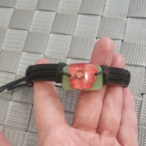Handmade Black and Green Bracelet with Red Accent
